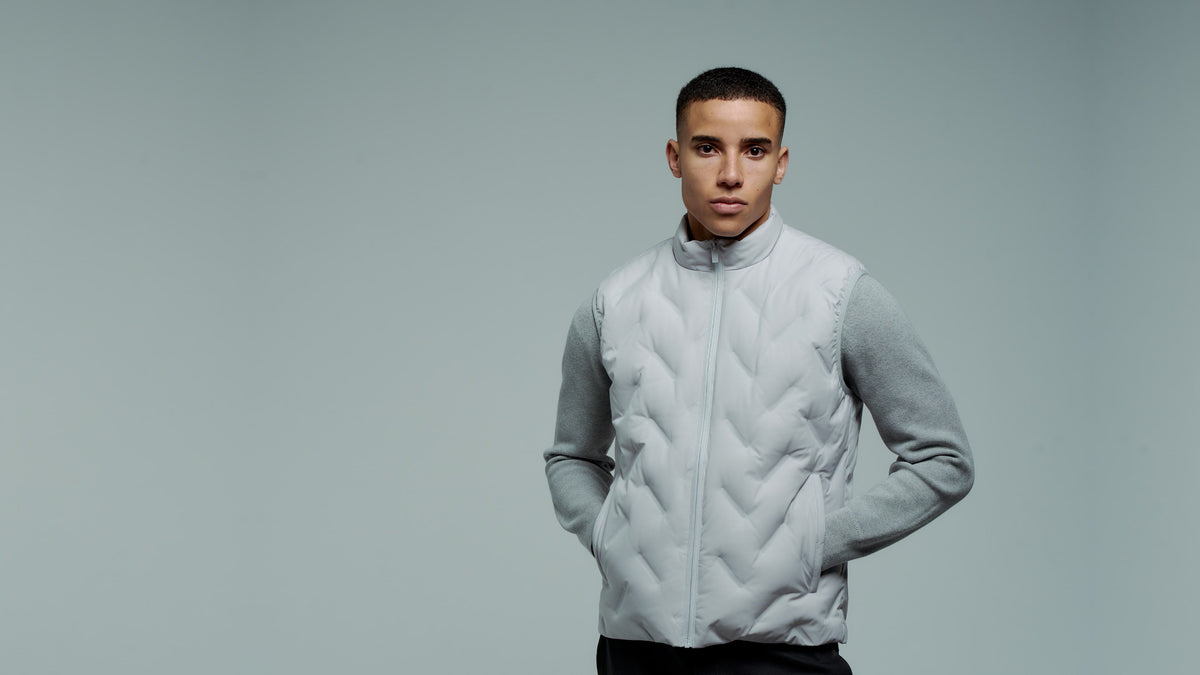 ARIO Gilet Vest — studio hero